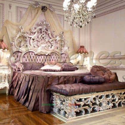 ornamental wooden structure luxury classic italian baroque style bedroom royal palace elegant venetian bed proposal high-end quality italian handmade furniture manufacturing unique exclusive made in Italy bespoke solid wood furniture decorated silver leaf finish headboard handmade carved classic bed bench solid wood decorated lacquered traditional venetian night table elegant angels for curtains fixing