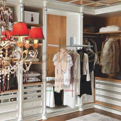 royal luxury classic empire italian walk in closet exclusive fixed furniture handcrafted made in Italy solid wood decorative silver leaf details handmade best artisanal custom made spacious wardrobe furniture classicla baroque style details unique exclusive walk in closet solid wooden luxury furniture handmade in Italy exclusive interior design home furnishings