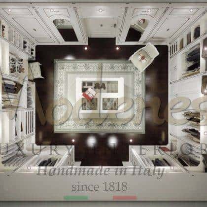 exclusive interiors luxury made in Italy classic wardrobes collection majestic unique design traditional handcrafted island dress top precious italian fabrics solid wood cravd silver leaf details handmade manufacturing timeless design high-end quality bespoke royal palace home furnishings