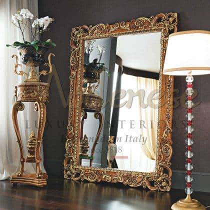 handcrafted luxury rectangular figured mirror carvings frame details handmade baroque traditional venetian solid wood refined golden finishes handmade ornamental top decorations best quality artisanal production high-end quality made in italy manufacturing