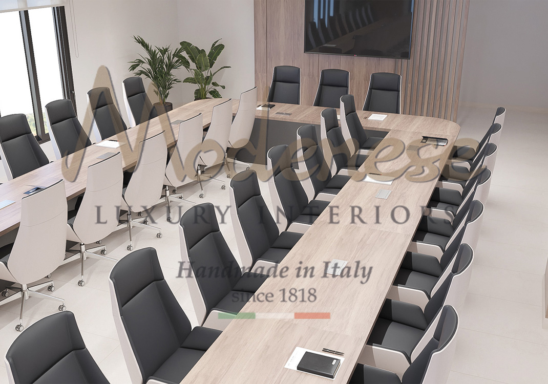 Modenese interior design for contemporary meeting room with grey and white leather swivel armchairs