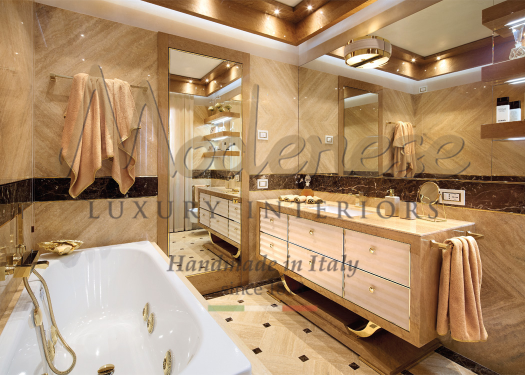 Modenese Interiors contemporary beige bathroom with luxury sink and bath tub