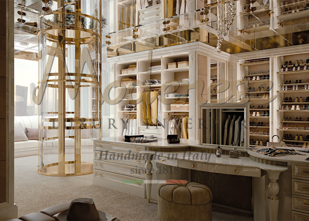 Contemporary Modenese walk-in closet with gold metallic details vanity and glass elevator