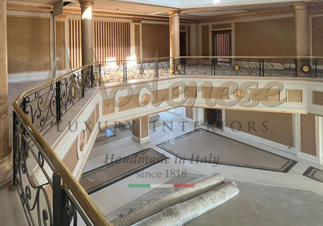 Metallic handrails of a balcony with columns Modenese fitout interior design