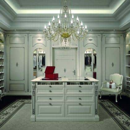 handmade artisanal dressing room production high-end made in Italy handcrafted fixed furniture refined elegant silver leaf details majestic drawers wardrobe ideas premium quality solid wood interiors ornamental interiors elegant dressing island home decorations royal palace traditional timeless baroque design customized top quality materials
