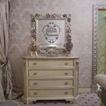 classy commode pearl ivory finish refined silver details italian artisanal manufacturing exclusive italian classic baroque graceful furniture tasteful mirror made in Italy majestic silver leaf finish italian artisanal manufacturing traditional home décor customization production