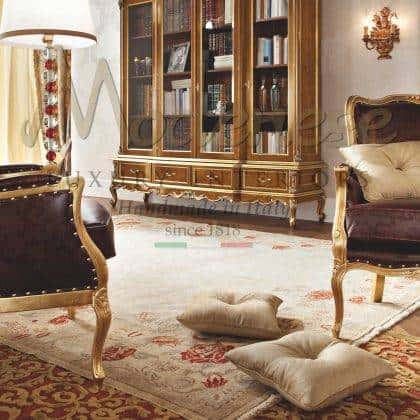 tasteful custom made solid wood bookcase refined top libraries ofiice projects refined golden leaf detais finish bespoke refined furniture collection luxury italian artisanal handmade production traditional home furnishing high-end quality opulent design royal villa made in Italy fabrics