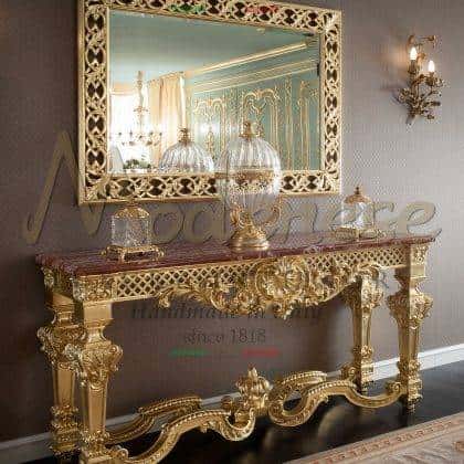 tasteful custom made solid wood carviings console refined top rosso francia marble refined golden leaf detais finish bespoke refined furniture collection luxury italian artisanal handmade production traditional home furnishing high-end quality opulent design royal villa made in Italy fabrics